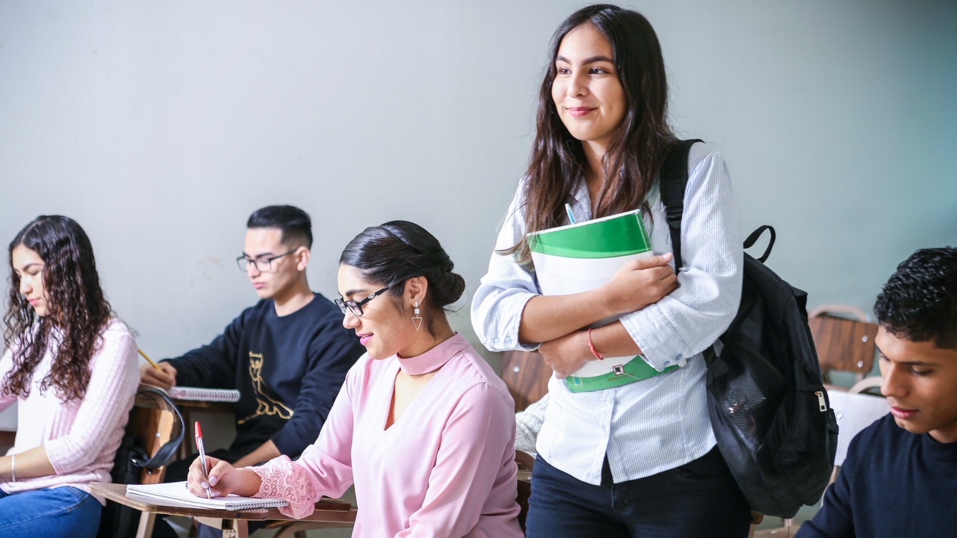 Student taking exam/working